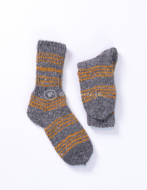 High, thick, white socks with wool filling with a gray, highlander pattern High, thick, white socks with wool filling with a gray, highlander pattern