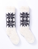 High, thick, white socks with wool filling with a gray, highlander pattern