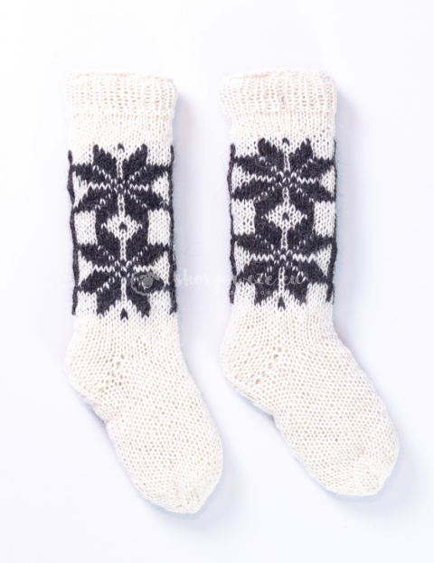 High, thick, white socks with wool filling with a gray, highlander pattern