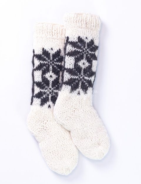 High, thick, white socks with wool filling with a gray, highlander pattern