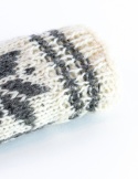 High, thick, white socks with wool filling with a gray, highlander pattern
